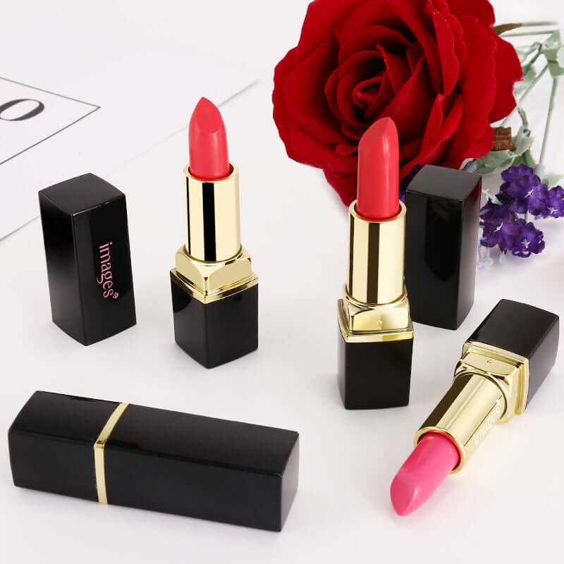 Moisturizing Lip Gloss in various pink shades with black packaging, surrounded by a red rose and purple flowers.